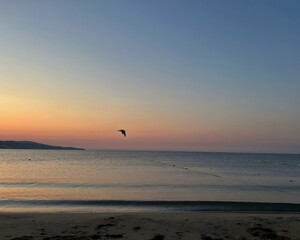 kite surfing at sunset