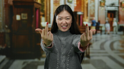 Woman making gesture indoors with a playful expression in a church setting, blending traditional...