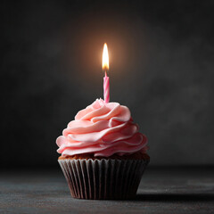 Single Cupcake with Pink Frosting and Candle on Dark Background