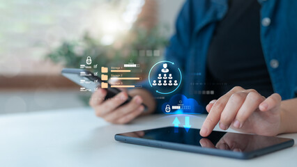 Person using smartphone and tablet with cloud storage interface, team structure, and secure file...