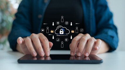 Close-up of woman using tablet with cloud data security icon, teamwork, and technology interface,...