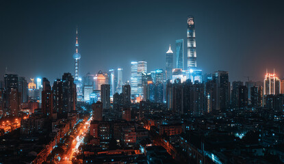 Fototapeta premium Vibrant cityscape at night with illuminated skyscrapers and traffic trails