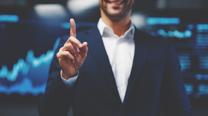 Faceless businessman in a suit is smiling and holding up his index finger.