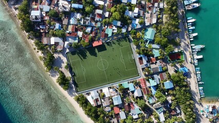 Aerial Paradise in the Maldives – Crystal Clear Water, Islands & football field