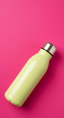 An eye-level studio shot captures a chartreuse metal water bottle against a vibrant pink background, radiating a fresh and modern appeal.