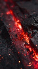 Glowing red embers on dark rock, abstract fire and heat concept