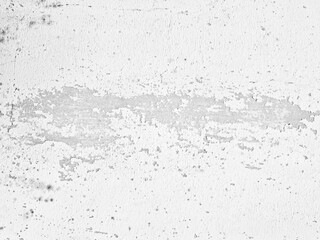 Close-up of a weathered wall with peeling paint and visible texture