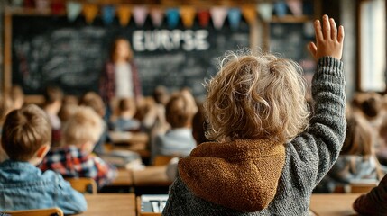 Child raising hand in classroom