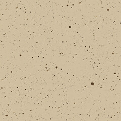Smooth beige textured surface with scattered small and irregularly spaced marks