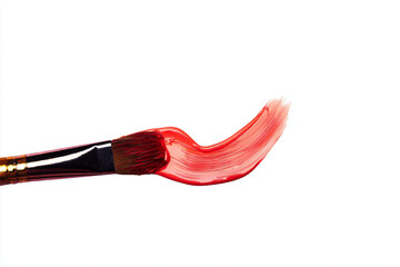 a brush with red paint on it