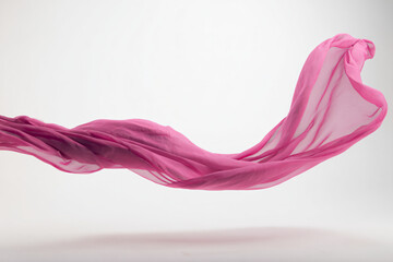 a woman in a pink dress is flying through the air