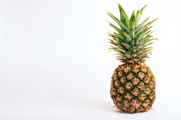 a pineapple sitting on a white surface