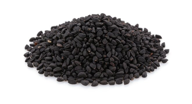 Pile of black cumin seeds on a white background
