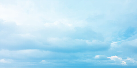 Cloudy blue summer storm  in the sky, watercolor background, horizontal view, beautiful cloudscape, fresh air, nature shining light, sunrise sky, panoramic view, daylight, vast fluffy tiny white sunsh