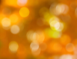 Fototapeta premium Orange abstract background blur with bokeh lights