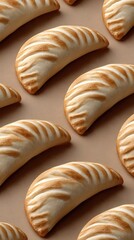 Plump little ravioli pasta arranged neatly on parchment paper, showcasing their delightful shape and texture for culinary inspiration