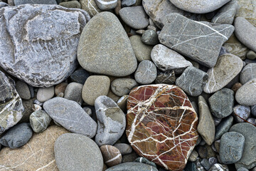 Background with round pebble stones. Stones beachsmooth. A lot of sea pebbles. Natural abstract...