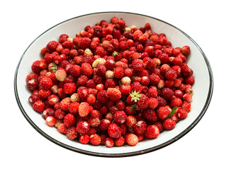 Wild berries. Plate of strawberries.