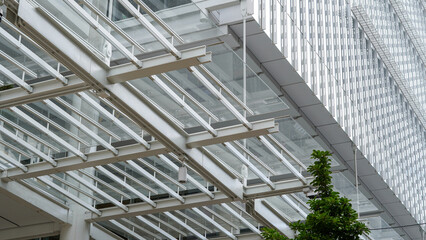 Glass facade with geometric shapes, modern architecture background pattern