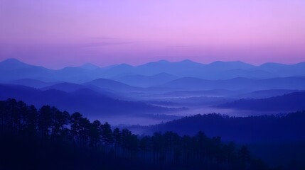 A tranquil vista of mountain ranges bathed in a muted twilight.