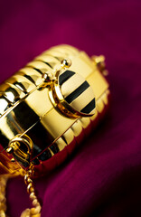 Luxury Gold Bee Compact: Elegant Purse Accessory, Closeup View
