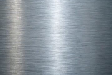 Smooth brushed metal texture background with a soft gradient, suitable for use in web design, product mockups, and creating a sophisticated look