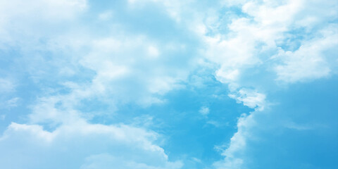Cloudy blue summer storm  in the sky, watercolor background, horizontal view, beautiful cloudscape, fresh air, nature shining light, sunrise sky, panoramic view, daylight, vast fluffy tiny white sunsh