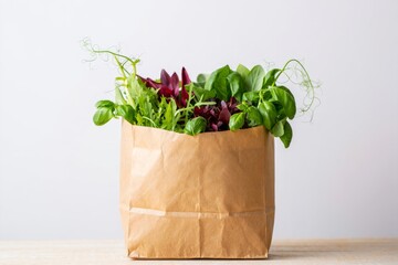 Freshly Harvested Greens Overflowing A Brown Paper Bag Placed On A Wooden Table Against A White Backdrop