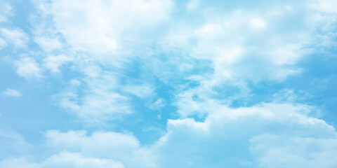 Cloudy blue summer storm  in the sky, watercolor background, horizontal view, beautiful cloudscape, fresh air, nature shining light, sunrise sky, panoramic view, daylight, vast fluffy tiny white sunsh