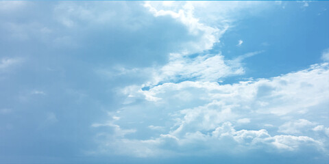 Cloudy blue summer storm  in the sky, watercolor background, horizontal view, beautiful cloudscape, fresh air, nature shining light, sunrise sky, panoramic view, daylight, vast fluffy tiny white sunsh