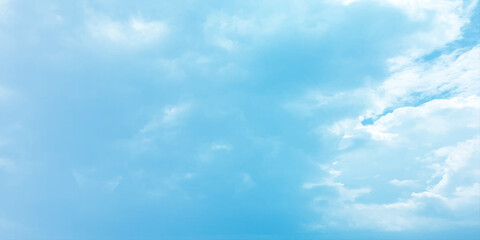 Cloudy blue summer storm  in the sky, watercolor background, horizontal view, beautiful cloudscape, fresh air, nature shining light, sunrise sky, panoramic view, daylight, vast fluffy tiny white sunsh
