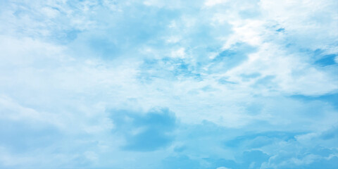Cloudy blue summer storm  in the sky, watercolor background, horizontal view, beautiful cloudscape, fresh air, nature shining light, sunrise sky, panoramic view, daylight, vast fluffy tiny white sunsh