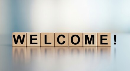 Wooden blocks spelling out the word welcome with a soft, blurred background, symbolizing a warm greeting and new beginnings