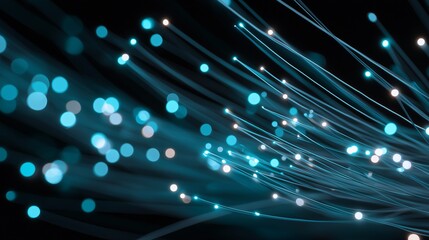 Abstract image of glowing fiber optics against a dark background, representing high-speed data transfer and technology. The image gives the impression of flowing light and connectivity