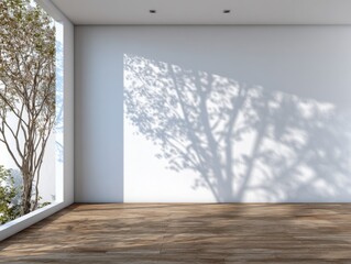 A room with a large window and a tree outside. The room is empty and has a lot of natural light coming in