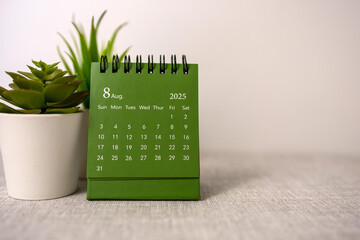 Hello August, August 2025 desk calendar for planning.