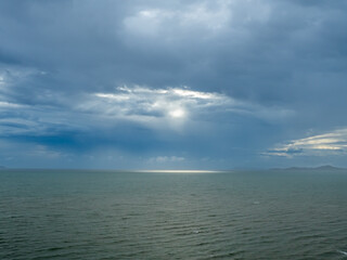 Seascape with strong wind and wave under cloudy sky in evening