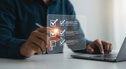 Hand pointing at digital checklist with laptop. Organization and productivity concept. Professional workspace with task management.