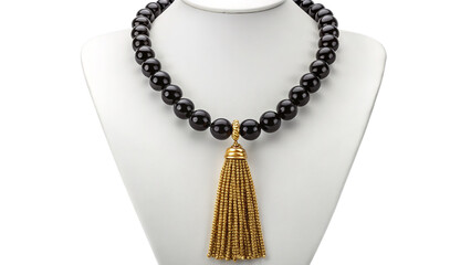 Elegant black bead necklace with gold tassel pendant displayed on a white mannequin bust
