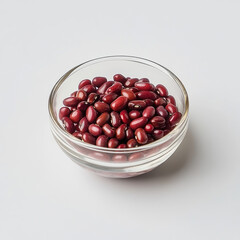 A small glass bowl of cooked red beans