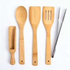Wooden kitchen utensil set with scoop, spoon, spatula and tongs on white background