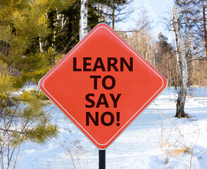 Learn to say no symbol. Concept words phrase Learn to say no on beautiful red road sign. Beautiful...