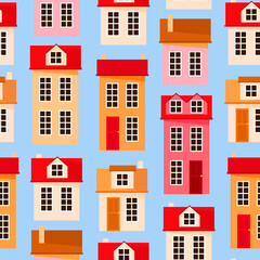 Naklejka premium Seamless pattern of Christmas European houses on a blue background