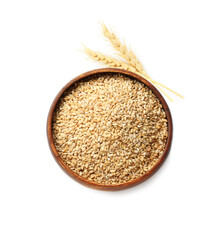 Wheat grains in bowl and spikelets on white background, top view