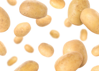 Raw potatoes in air against white background