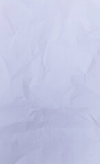 Obraz premium High-Resolution Crumpled White Paper Texture with Wrinkled and Folded Surface for Creative Backgrounds and Design Projects