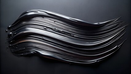 Abstract glossy black paint stroke with a textured surface, creating a dynamic and luxurious visual effect
