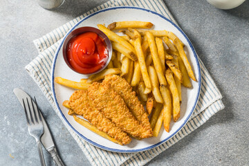 Deep Fried Tender Chicken Fingers and French Fries