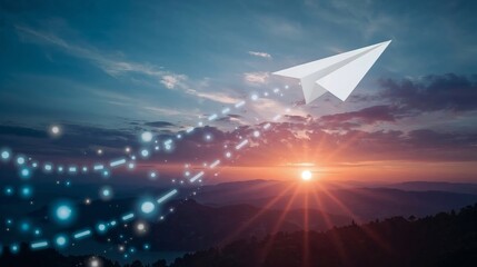 A paper airplane flying in the sky during sunset with a beautiful landscape