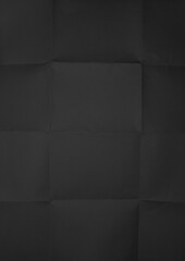 Isolated old black folded torn paper.